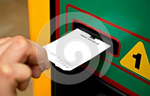 Insert ticket to a machine