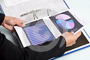 Inserting documents into binder photo