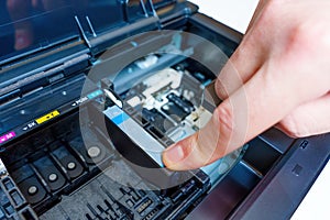 Inserting a New Ink Cartridge into an Inkjet Printer