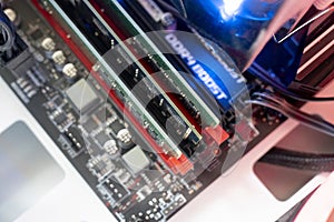 the inserting plug in the ram ddr memory card in the computer mainboard, random access memory