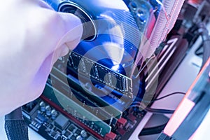 the inserting plug in the ram ddr memory card in the computer mainboard, random access memory