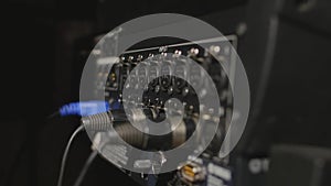 Inserting professional XLR audio cables to the rear panel of the professional recorder