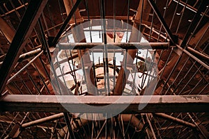 Inside abandoned cooling tower, abstract industrial metal construction