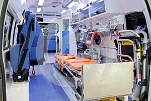 Inside an ambulance car with medical equipment for helping