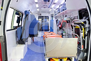 Inside an ambulance car with medical equipment for helping