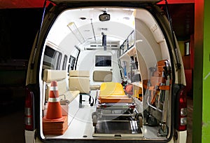 Inside an ambulance with medical equipment . Car for patient refer