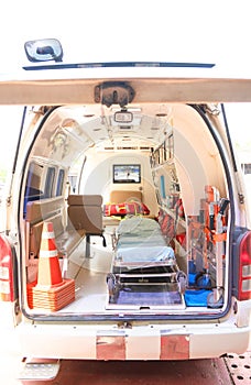 Inside an ambulance with medical equipment . Car for patient refer