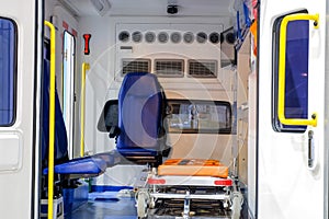 Inside an ambulance with medical equipment for helping