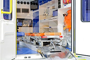 Inside an ambulance with medical equipment for helping