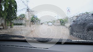 Inside car view blured traffic in rainy day with ambient sound