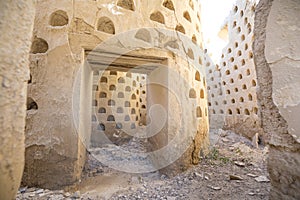 Inside crumbling walls of dovecote mud building in Ampudia
