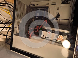 Inside a Desktop Computer Case with Cables and Components