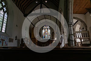 Inside dimly lit historic Christian church