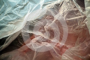 Inside a disposable plastic bag. Lightweight transparent, reusable plastic waste. Rubbish bag, plastic recycling, environmental