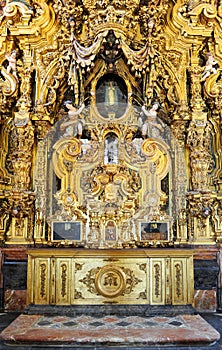 Main altar of the Domestic Chapel. Church of San Luis in Seville, Spain photo