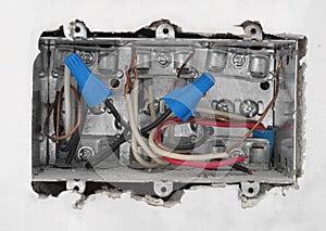 Inside of an electrical box in drywall.