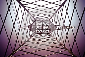 Inside of an electricity pylon - power tower and transmission lines concept