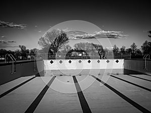 inside an empty and drained winterized swimming pool