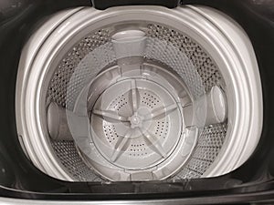 The inside empty drum of new washing machine