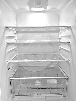 Inside empty refrigerator fridge photo