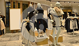 inside of a fashion clothing shop,Autumn winter fashion Mannequins