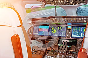 Inside of flight simulator cockpit - dashboard, autopilot, engine control. Runway view