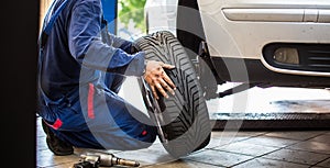 Inside a garage - changing wheels/tires