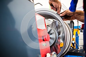 Inside a garage - changing wheels/tires