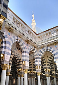 The inside of the Haram Nabawi Mosque during the day when the dome is opened