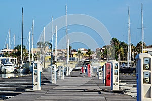 Inside the harbor load the boats with electric power