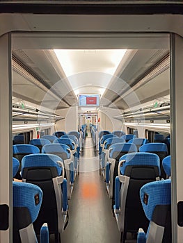 Inside the hushed confines of an empty passenger train