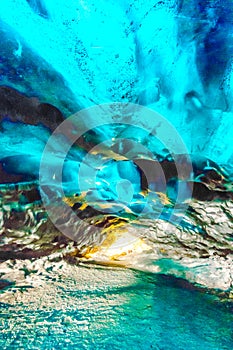 Inside ice cave in Vatnajokull, Iceland .