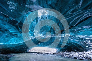 Inside an ice cave in Vatnajokull, Iceland, the ice is thousands of years old and so packed it is harder than steel and crystal