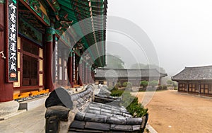 Inside Korean Buddhistic Temple Daeseongam, Great Saint Hermitage, near Beomeosa on a foggy day. Located in Geumjeong, Busan,