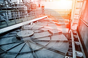 Inside modern wastewater treatment plant. Closed sewage reservoir with dirty water