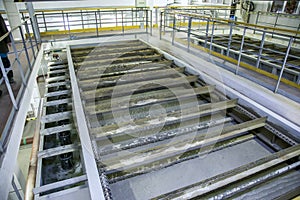 Inside modern wastewater treatment plant. Flotation tank with waste water