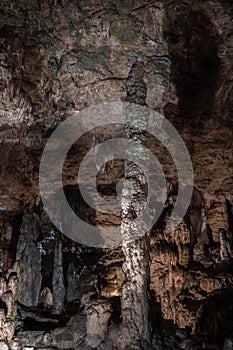 Inside the mysterious flowstone cave `NebelhÃÂ¶hle` with stalagmites and stalactites in Germany photo