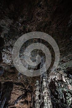 Inside the mysterious flowstone cave `NebelhÃ¶hle` with stalagmites and stalactites in Germany