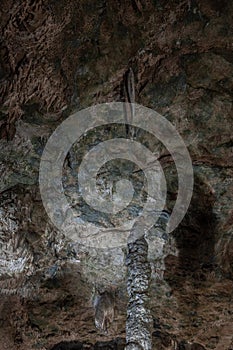 Inside the mysterious flowstone cave `NebelhÃ¶hle` with stalagmites and stalactites in Germany