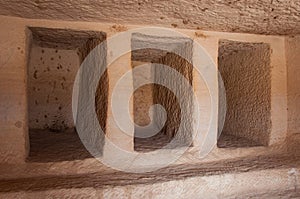 Inside a Nabatean tomb in MadaÃÂ®n Saleh archeological site, Saud photo