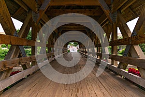 Inside a Naperville Riverwalk Covered Bridge over the DuPage River photo