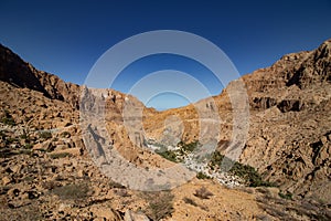 Inside the narrow canyon of Wadi Tiwi at Shab near Mascat in Oman photo