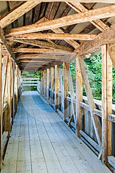 Inside a narrow wooden bridge