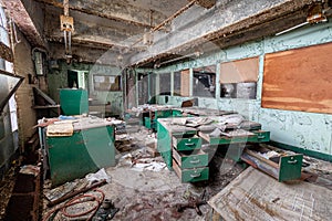 Inside an office in an abandoned shut down power plantâ€”vandalism, decay, destruction, debris