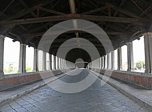 Inside of old Covered Bridge in Pavia Town in Italy photo