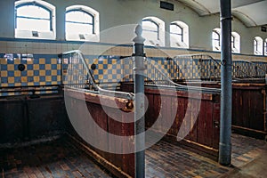 Inside old German stable or barn with horse boxes