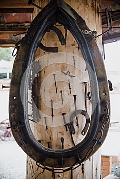 Inside an old vintage blacksmith and workshop, close up on horse