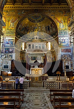 Inside the ornate Basilica of Santa Maria in Trastevere, Rome, Italy