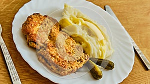 Inside out beef schnitzel with potato pyre on plate