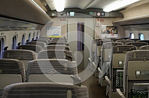 Inside the passenger compartment of a high-speed train.
